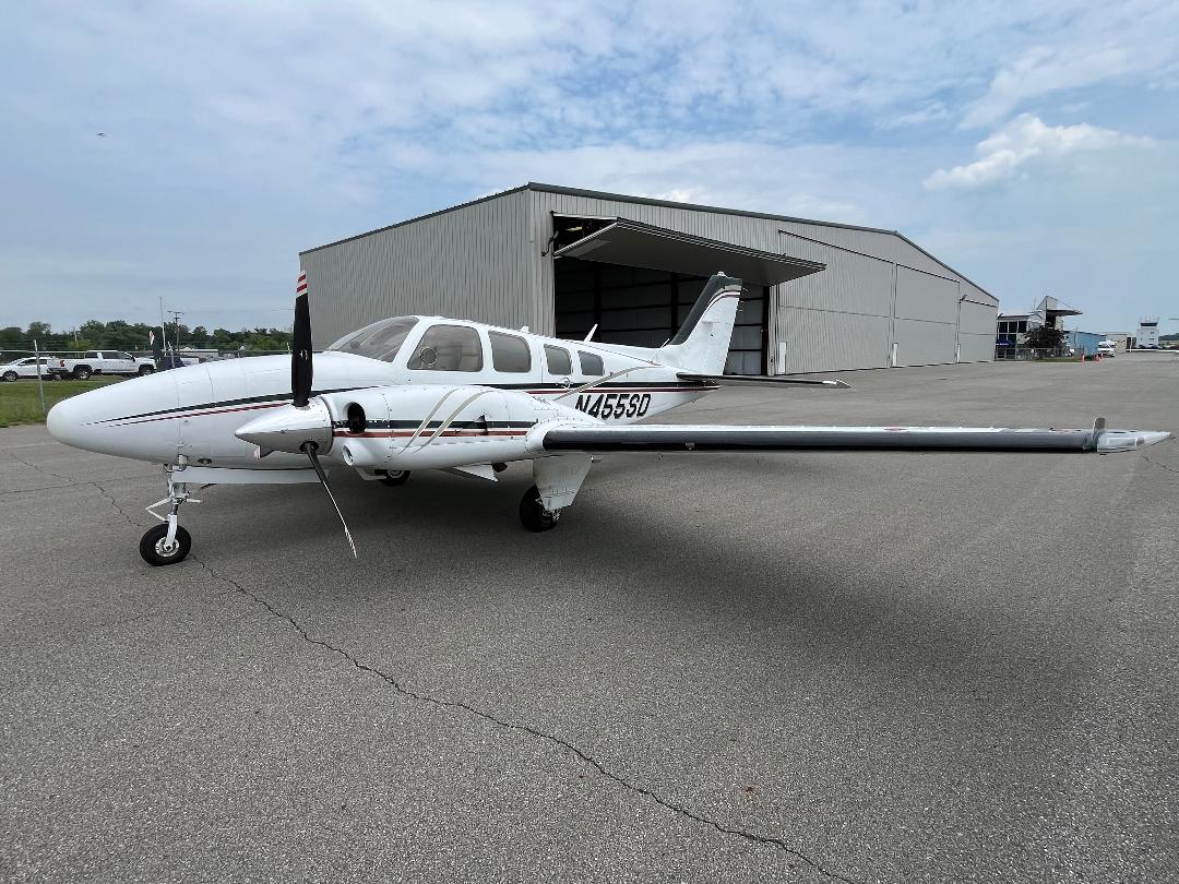 photo of Beechcraft Baron exterior in front of hanger